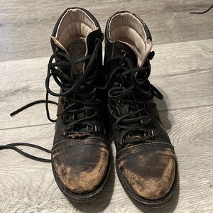 Distressed black freebird boots